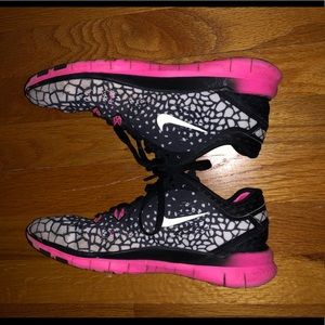 Hot pink black and silver Nike sneakers